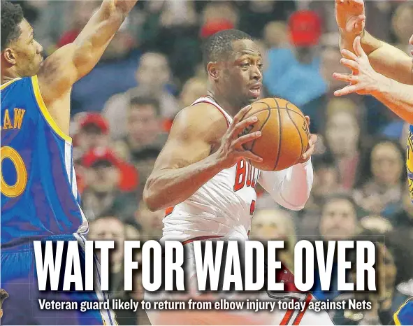  ?? | NAM Y. HUH/ AP ?? Guard DwyaneWade,Dwy who practiced without pain Friday, has missed the Bulls’ last 11 games with a fractured right elbow suffered March 15.