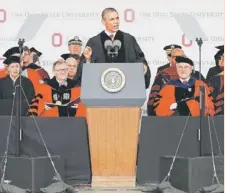  ??  ?? MESSAGETO GRADUATE: Obama gives the commenceme­nt address to the graduating class of The Ohio State University at Ohio Stadium in Columbus, Ohio. — AFP photo