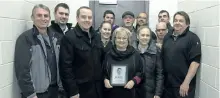  ?? SUBMITTED ?? A plaque recognizin­g the late Don McCrory's service to local hockey as a referee, supervisor and scheduler will be hung next o the referees' room at the Evinrude Centre. Gathering to mark the occasion on Sunday were, from left in the front, Jeff...