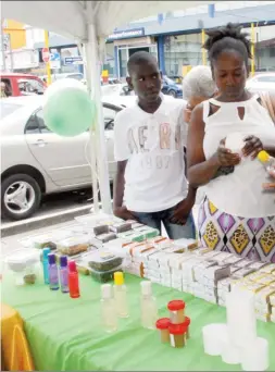  ??  ?? Local soaps on sale outside the Robb and C