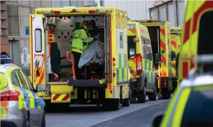  ?? Photograph: Mark Thomas/ REX/Shuttersto­ck ?? Lines of ambulances outside the Royal London hospital last week as cases of Covid-19 surge in the capital.