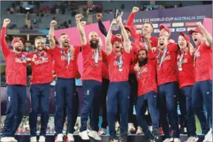  ?? (AFP) ?? England players celebrate after winning the ICC men’s Twenty20 World Cup 2022 final at the Melbourne Cricket Ground (MCG) in Melbourne on Sunday.