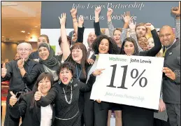  ??  ?? DELIGHT: John Lewis staff celebrate last year’s 11 per cent bonus