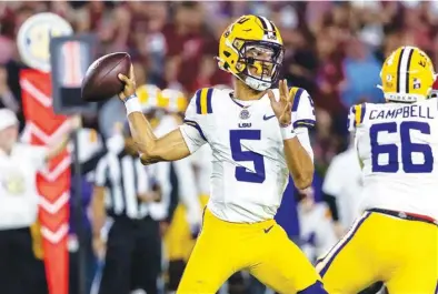  ?? (AP photo/vasha Hunt, File) ?? LSU quarterbac­k Jayden Daniels (5) throws a passduring the first half of an NCAA college football game against Alabama on Nov. 4 in Tuscaloosa, Ala.