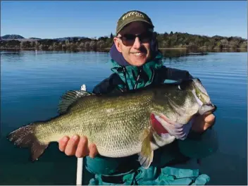  ?? FILE PHOTO ?? Bass fishing at Clear Lake is red-hot right now. Other fish such as crappie and bluegill are also abundant and good choices for the youngsters.