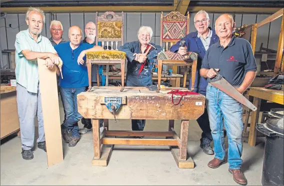  ?? Picture ?? Chris Austin
Ian McNaughton, Drew McHutchon, Ian Hamilton, Robert Mann, Ceci Alderton, Ian Graham and Mike Osinski at The Men’s Shed in Dunoon