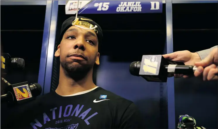  ?? — GETTY IMAGES FILES ?? Duke’s Jahlil Okafor is one of the top two prospects for the upcoming NBA draft. The Blue Devils could lose three of their star freshmen after winning the title this year but two more five-star prospects have already committed to Duke’s squad to take a...