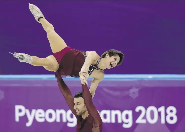  ?? LEAH HENNEL ?? Meagan Duhamel and Eric Radford compete in the pair free skating event at the Gangneung Ice Arena on Thursday. The pair won bronze.