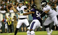  ?? MIKEY REEVES — FOR MEDIANEWS GROUP ?? Eagles quarterbac­k Josh McCown, left, tries to get off a pass while under pressure from Baltimore linebacker Tim Williams (56). Tackle Jordan Mailata, right, tries to keep Williams off of McCown.