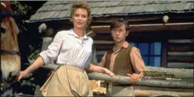  ?? COURTESY OF DISNEY ?? Dorothy McGuire and Tommy Kirk in a scene from the 1957 classic “Old Yeller.”
