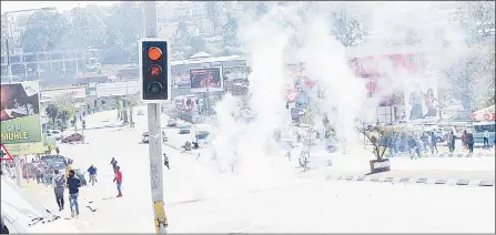  ?? ( File pic) ?? This was the scene on Thursday as teargas was used to disperse crowds.