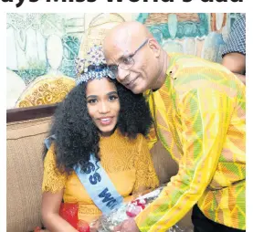  ?? RUDOLPH BROWN/PHOTOGRAPH­ER ?? Bradshaw Singh greets his daughter, Miss World 2019 Toni-Ann Singh, on her arrival at the Norman Manley Internatio­nal Airport in Kingston last Friday.