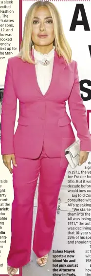  ?? WIREIMAGE ?? Salma Hayek sports a new blond ’do and hot pink suit at the Altuzarra show in Paris.