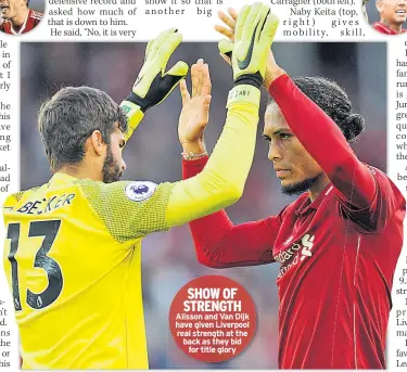  ??  ?? SHOW OF STRENGTH Alisson and Van Dijk have given Liverpool real strength at the back as they bid for title glory