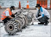  ?? ULET IFANSASTI/GETTY ?? Investigat­ors looking into the crash of a Lion Air 737 want to know what actions pilots took to counteract a dive.