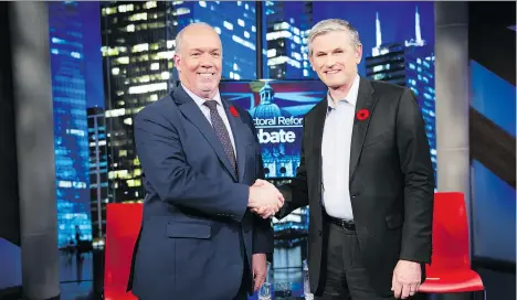  ?? GERRY KAHRMANN ?? B.C. Premier John Horgan and B.C. Liberal Party Leader Andrew Wilkinson took part in a televised debate on electoral reform early this month. British Columbians are now deciding which electoral system they most prefer through a provincewi­de referendum.