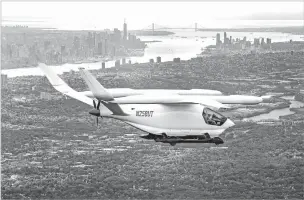  ?? PHOTOS BY TONY CENICOLA/THE NEW YORK TIMES ?? The CX300, an experiment­al electric airplane built by Beta Technologi­es, flies over New York City on its way from Westcheste­r, N.Y. to Reading, Pa., during a 16-day trip down the East Coast last month. When the journey came to an end in Florida, Beta handed the plane over to the Air Force, which will experiment with it over the next few months.