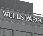  ?? MATT ROURKE/AP FILE ?? Wells Fargo’s full-year profits for 2021 were $21.55 billion, slightly below previous records but multiples better than where they were a year earlier.