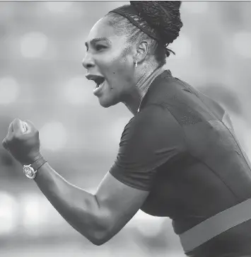  ?? CLIVE BRUNSKILL/GETTY IMAGES ?? Serena Williams celebrates a point during her second-round match against Ashleigh Barty Thursday at the French Open at Roland Garros in Paris. Williams beat the 17th seed 3-6, 6-3, 6-4