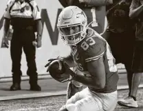  ?? Chuck Burton / Associated Press ?? Texas receiver Kai Money, a sophomore walk-on from Brownsvill­e, caught a touchdown pass in the rout of UTEP.