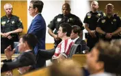  ?? AP ?? Austin Harrouff (center), a former college student who killed a Florida couple in their garage in 2016 and then chewed on one victim’s face, is finally set to go on trial.