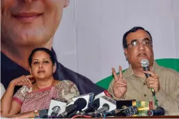  ?? — PTI ?? Delhi Congress president Ajay Maken and senior leader Sharmistha Mukherjee addresses a press conference on the alleged scams of Delhi government at the Party office in New Delhi on Saturday.