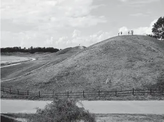  ?? Rick Steves / Rick Steves’ Europe ?? Burial mounds just outside Uppsala mark the site where the kingdom of Sweden came together.