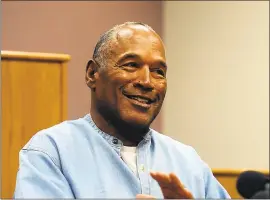  ??  ?? JASON BEAN — THE RENO GAZETTE-JOURNAL VIA AP Former NFL football star O.J. Simpson attends his parole hearing at the Lovelock Correction­al Center in Lovelock, Nev., on Thursday. Simpson was granted parole Thursday after more than eight years in prison...