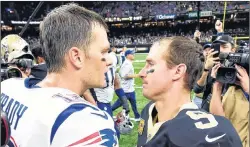  ?? AP PHOTO ?? New England Patriots quarterbac­k Tom Brady (left) greets New Orleans Saints quarterbac­k Drew Brees after an NFL game in New Orleans on Sunday.