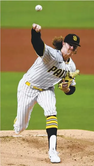  ?? DENIS POROY AP ?? Padres starter Chris Paddack delivers a pitch during the first inning Friday against the Mariners.