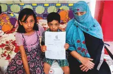  ?? Ahmed Ramzan/Gulf News ?? Janat Alferdoos with her two children Mariam and Masoud at their home in Sharjah’s Ghubaiba area.