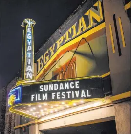  ?? Arthur Mola The Associated Press ?? The marquee of the Egyptian Theatre on Jan. 28 promotes the Sundance Film Festival in Park City, Utah. Organizers on Wednesday said that this year they will premiere over 70 films on a custom online platform during the seven-day event.