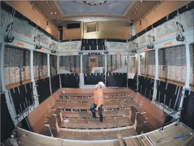  ?? PICTURES: SIMON HULME ?? CHECKING THE WORK: Foreman Allan Brenkley in the theatre. Old seats have been removed and new ones will be put it in.