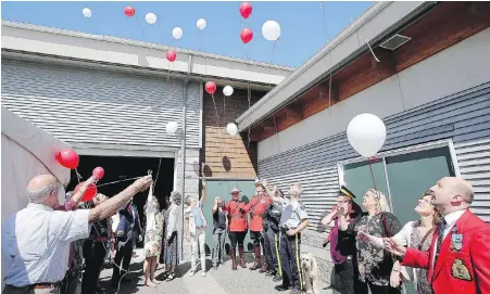  ?? ADRIAN LAM, TIMES COLONIST ?? Friends and family release balloons outside Mary Winspear Centre in Sidney, where a celebratio­n of life was held on Thursday for retired Mountie Krista Carle. Carle became an advocate against sexual harassment in the RCMP. She died by suicide on July 6.