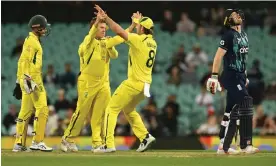  ?? Photograph: Dean Lewins/AAP ?? Adam Zampa (centre left) celebrates the wicket of Sam Billings, who was out for 71.