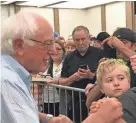  ?? BILL GLAUBER / MILWAUKEE JOURNAL SENTINEL ?? Sen. Bernie Sanders greets supporters in Eau Claire.