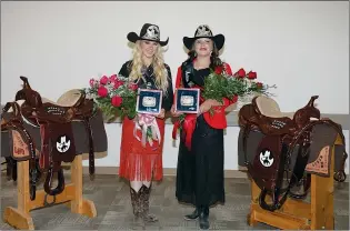  ?? PHOTO COURTESY RANDY FEERE ?? Medicine Hat Exhibition & Stampede Rodeo Princess Kearra Borthwick and Rodeo Queen Shaylyn Hunt pose with their belt buckles and saddles on the Friday of Stampede.