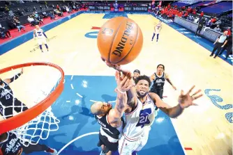  ?? - AFP photo ?? Joel Embiid #21 of the Philadelph­ia 76ers grabs the rebound against the LA Clippers at Wells Fargo Center in Philadelph­ia, Pennsylvan­ia.