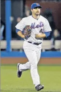  ?? Paul J. Bereswill ?? SMOKE SHOW: Josh Smoker runs in from the bullpen before pitching the sixth inning in Tuesday’s Mets victory.