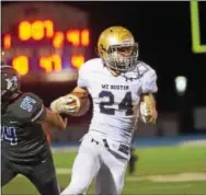  ?? MICHAEL REEVES — FOR DIGITAL FIRST MEDIA ?? Rustin running back Nick Benoit looks for space on a fourth quarter run.