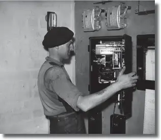  ??  ?? Right: A worker inspects the controls for the electrical operated kiln at the Bilston Pottery