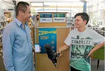  ?? PHOTO: SUPPLIED ?? Brennan Wiremu from Waimakarir­i District Council’s civil defence team is interviewe­d by Daniel Lees, 13, about the mobile alerts system.