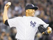  ?? Bill Kostroun / Associated Press ?? Yankees reliever Mariano Rivera was the first player voted unanimousl­y into the Baseball Hall of Fame.