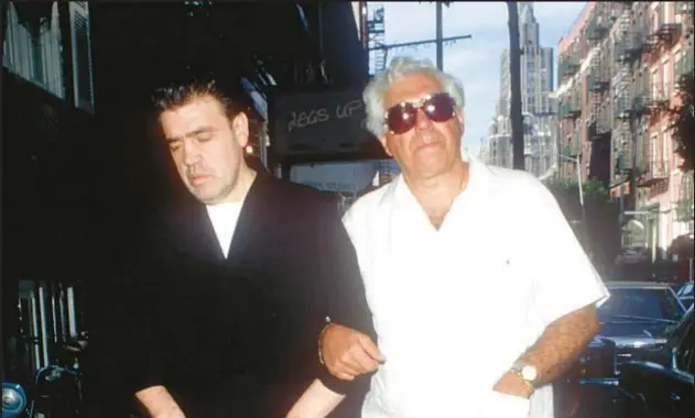  ?? GETTY ?? Genovese mob boss Vincent “The Chin” Gigante (left) and his brother Father Louis Gigante take a stroll in the Village back in 1988. Now that the mobster and the priest are both dead, family members, including Salvatore Gigante (below L), whose college career allegedly “focused on hammer throwing,” are waging war in court.