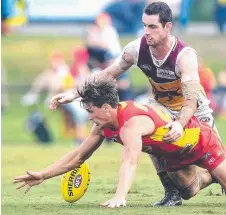  ??  ?? David Swallow does the dirty work in a pre-season game.