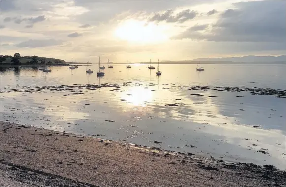  ??  ?? Our latest In the Frame competitio­n entry comes from Courier reader George Clark from Dechmont.
He took this spectacula­r photo of the shoreline and boats harboured at Blackness Bay, situated along the Firth of Forth, at sunset during his recent visit...