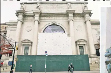  ?? ?? IN HIDING: The Museum of Natural History’s monument to former President Theodore Roosevelt is shielded from view on Monday, two weeks after it was announced that the statue would head to the Roosevelt Presidenti­al Library in North Dakota.