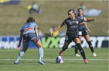  ?? ?? Macey Fraser dribbles during an A-League Women match between the Phoenix and Sydney FC. The midfielder has been described as ‘‘the full package’’. GETTY IMAGES