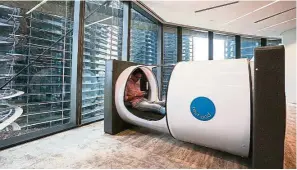  ??  ?? Rest pods that resemble magnetic resonance imaging machines for Prudential staff to take 40 winks.