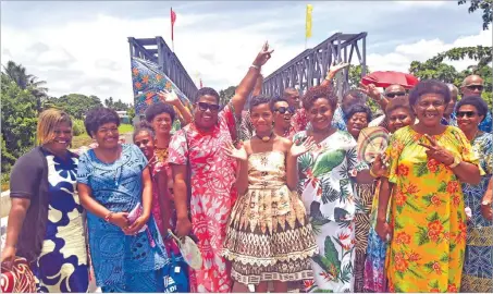  ?? Picture: JONACANI LALAKOBAU ?? Villagers in jovial mood after the opening of a new $4million bridge at Muana Village in Toga, Rewa yesterday.
